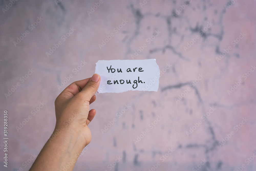 Wall mural motivation and inspirational quotes - you are enough. blurry background.