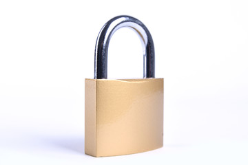 Naklejka premium Locked Golden Padlock with keys on the white background.