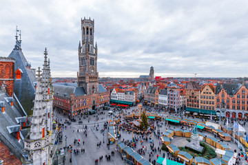 Cityscape and main square in Bruges (Belgium), Belfry Tower - obrazy, fototapety, plakaty