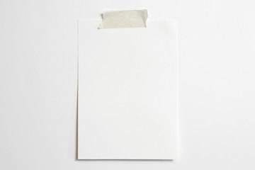 Blank portrait photo frame 10 x 15 size with soft shadows  and scotch tape isolated on white paper background as template for graphic designers presentations, portfolios etc.