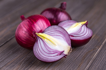 red onions on rustic wood
