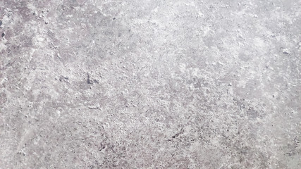 cracked stone wall background.Monohrome grunge gray abstract wall. Grunge old wall texture, concrete cement background.Rough building material of gray color