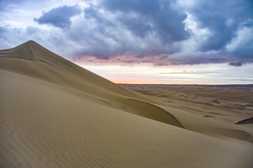 Fototapeta na wymiar Landscapes and sand dunes in the Nazca desert. Ica, Peru.