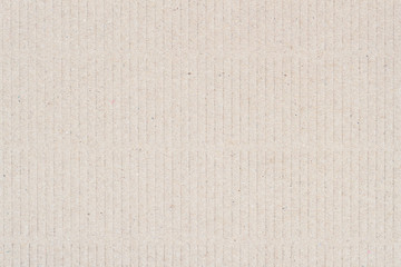 Organic cardboard with horizontal stripes. Recyclable material, has small inclusions of cellulose.
