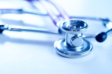 Stethoscope or phonendoscope on a doctor's desk. Medical and healthcare concept