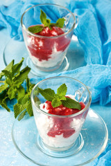 Creamed rice pudding with strawberry sauce