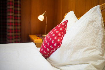 cozy bedroom red pillows hygge