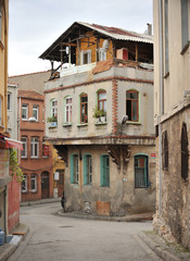 Beautiful old house in Istanbul, narrow street, rustic look. Tourist photo 