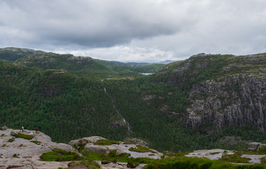 Mountains on the way to the Preachers Pulpit Rock in fjord Lysefjord - Norway - nature and travel background. Lake Tjodnane, july 2019