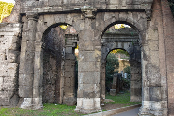 Fototapeta na wymiar Antique ruins on the streets in Rome