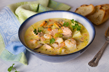 Seafood chowder with salmon, shrimps, crabmeat and mussels