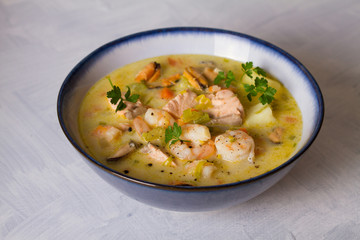 Seafood chowder with salmon, shrimps, crabmeat and mussels