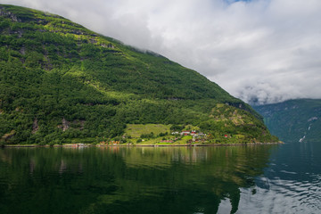 Naklejka na ściany i meble natural landscape at geirangerfjord in norway. July 2019