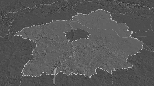 Středočesk&yacute;, region with its capital, zoomed and extruded on the bilevel map of Czech Republic in the conformal Stereographic projection. Animation 3D