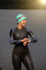one caucasian woman practicing triathlon swimming 