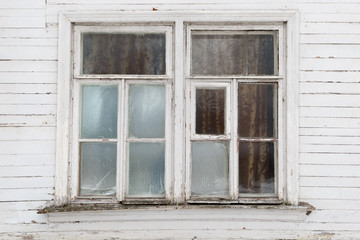Old window in a wooden building