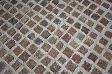 Street background with red and brown cobblestones