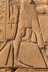 Luxor Governorate, Egypt, Karnak Temple, complex of Amun-Re. Embossed hieroglyphics on columns and walls.