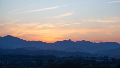 beautiful sunset sky over mountains on Sardinia