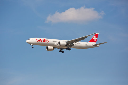 Chicago, USA - September 15, 2019: Swiss airline Boeing 777-300 on final approach to O'Hare International Airport. Swiss is the national airline of Switzerland.