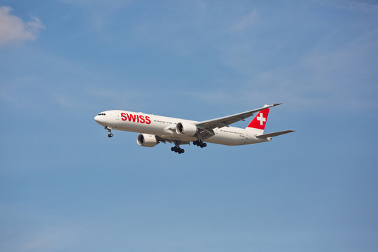 Chicago, USA - September 15, 2019: Swiss airline Boeing 777-300 on final approach to O'Hare International Airport. Swiss is the national airline of Switzerland.