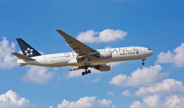 Chicago, USA - September 25, 2017: A United Airlines Boeing 777 painted with the Star Alliance logo on final approach to O'Hare International Airport.