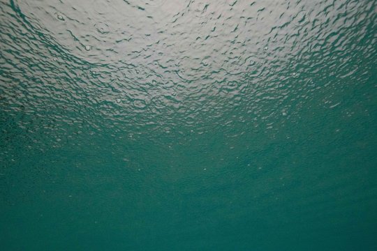 rain on top of ocean surface texture