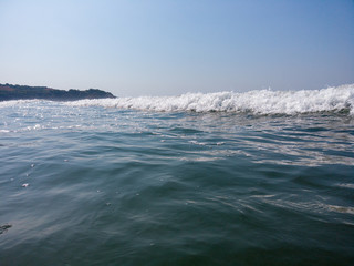 Sea waves on the beach. Sea waves in the water during the day