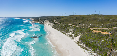 Aerial panoramic view of the wind farm  turbines on the coast at Ten Mile Lagoon Beach, near...