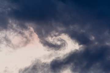 clouds swirl in the sky