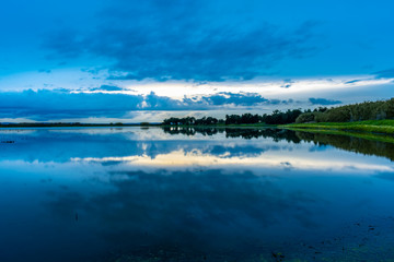 sunset reflection on the water of the lake