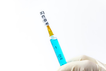 Novel coronavirus - 2019-nCoV concept, syringe isolated on white