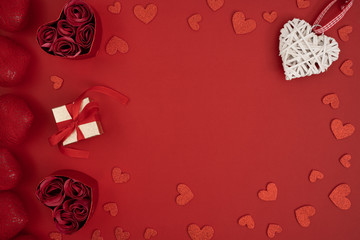 Top view of Valentine's day decoration on red background