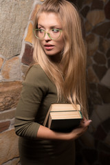 Young beautiful stylish girl in modern interior.