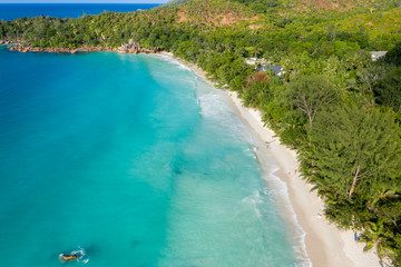 Fototapeta na wymiar Turquoise Anse Lazio Beach aerial view in Praslin Island Seychelles 