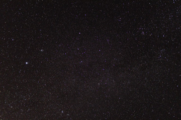 starry night sky with extremely clear conditions making a lot of constellations visible as well as some meteors or satellite trails shot from Tasmania