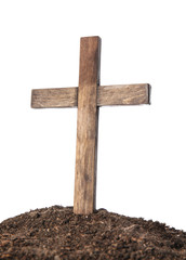 Wooden cemetery cross and soil on white background