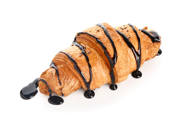 Tasty sweet croissant on white background