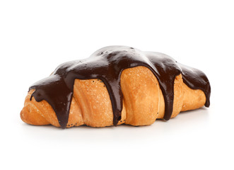 Tasty sweet croissant on white background