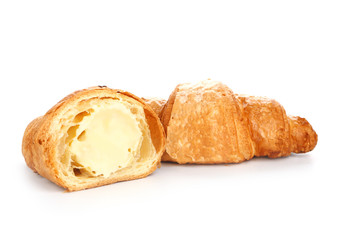 Tasty sweet croissants on white background