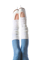 Young woman in ice skate shoes on white background