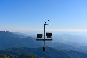 anemometer to check the wind speed and direction on the pillar over the mountain.