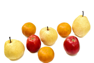 Apple,orange,wheelbarrow on white