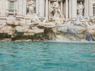 Fototapeta na wymiar The Trevi Fountain (Italian: Fontana di Trevi), the largest Baroque fountain in in Rome, Italy, one of the most famous fountains in the world. 