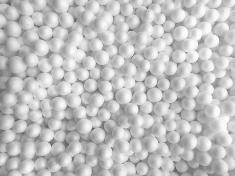 Background of white circle styrofoam ball pattern texture foam surface abstract background
