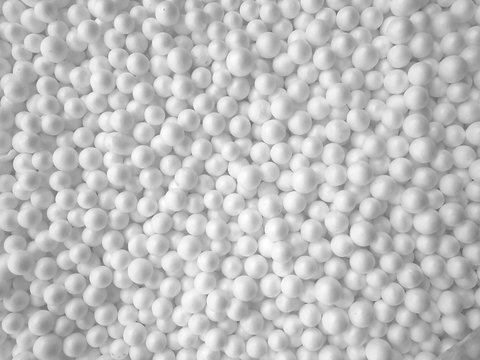 Background of white circle styrofoam ball pattern texture foam surface abstract background