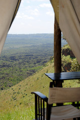 AFRICA, KENYA, AUGUST 3,  2010: Views from inside the bungalow, vacations in the african mountains. African holidays.