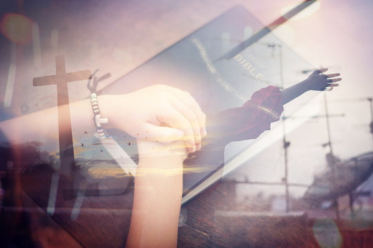 woman's closed hand is prayer and thank God.Christian Religion concept background.