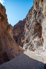 USA, Arizona, Mohave County, Lake Mead National Monument. A narrow slot canyon along the hiking...