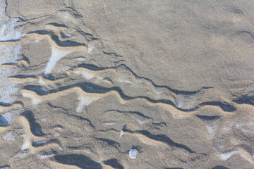 Snow and frozen sand by the river, natural background, Ob River, Siberia, Russia